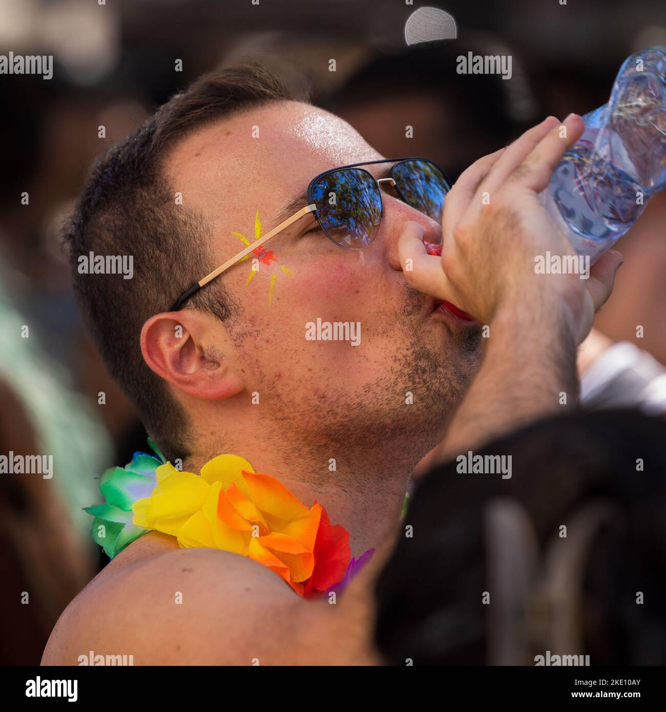 A closeup shot of people during the Love Parade in Zurich, Switzerland Stock Photo