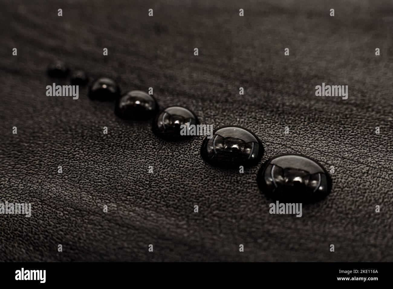 Drops of water on textiles. Waterproof fabric with drops on the surface Stock Photo
