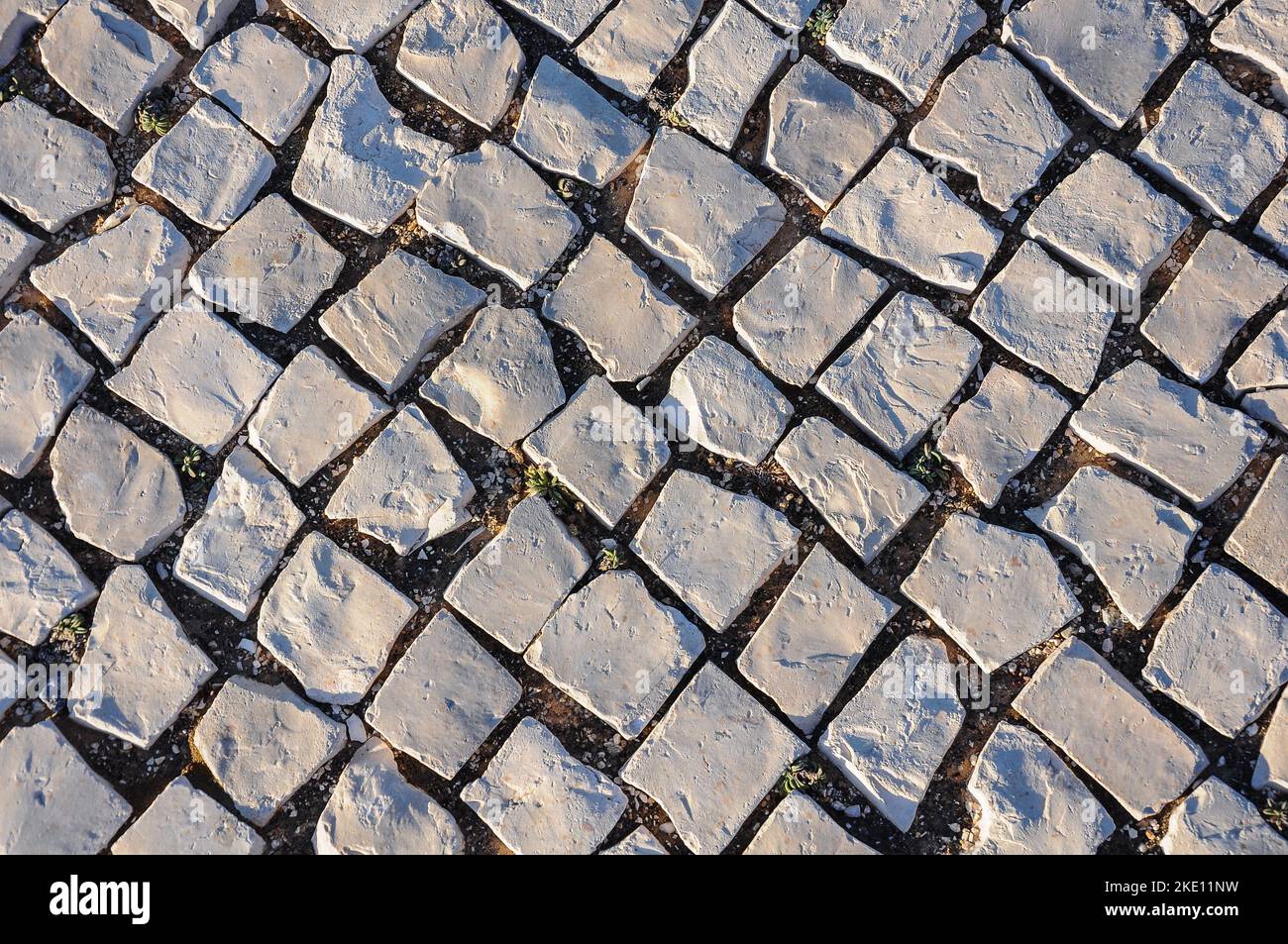 timeless-pathways-the-charm-of-cobblestone-pavements-2KE11NW.jpg