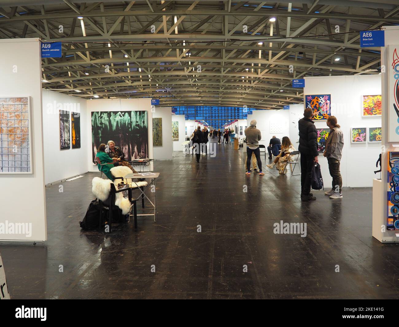 The visitors admiring the artworks at Discovery Art Fair 2022 in Frankfurt, Germany Stock Photo