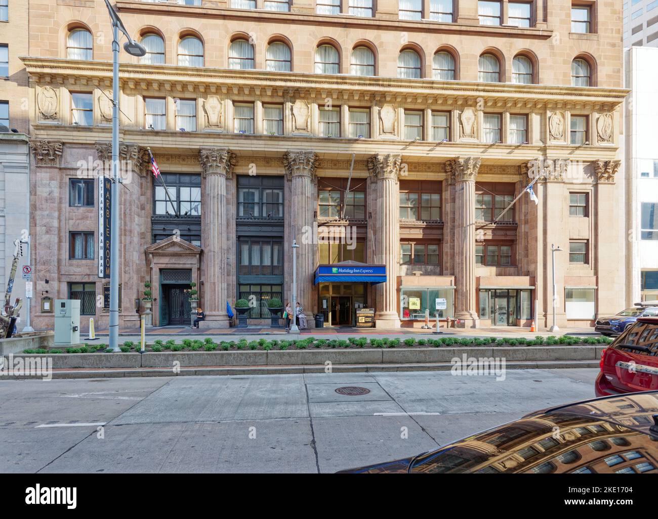 Historic New England Building now houses Holiday Inn Express, Marble Room restaurant, and condominium apartments. It has also been known as Guardian S Stock Photo