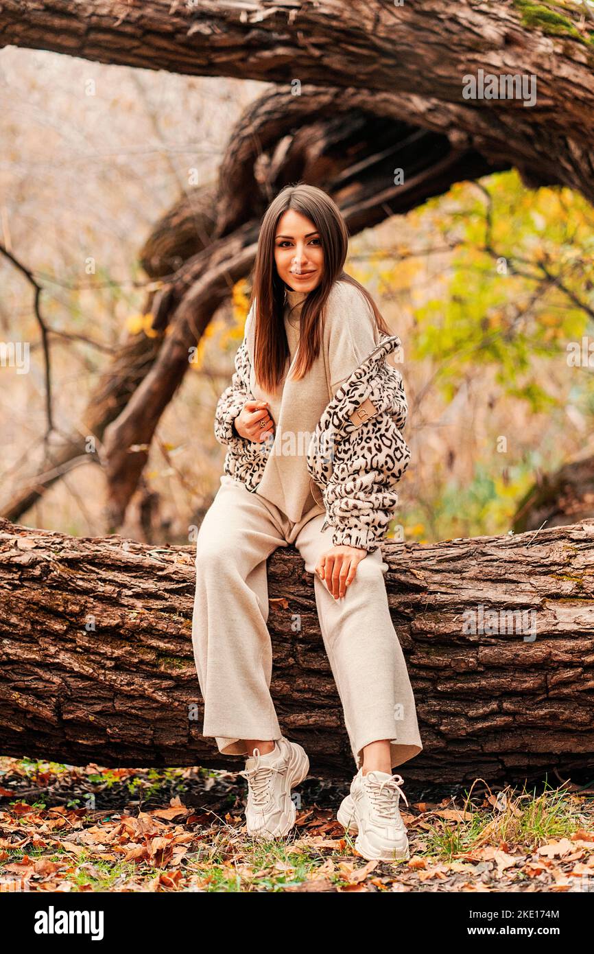 Girl in a stylish jacket looks at the camera Stock Photo Alamy