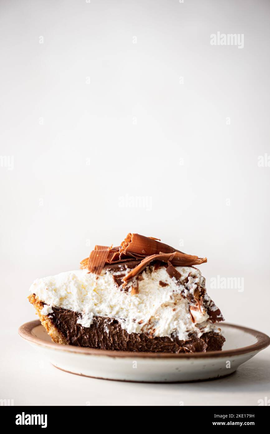 Single slice of chocolate pie with whipped cream Stock Photo