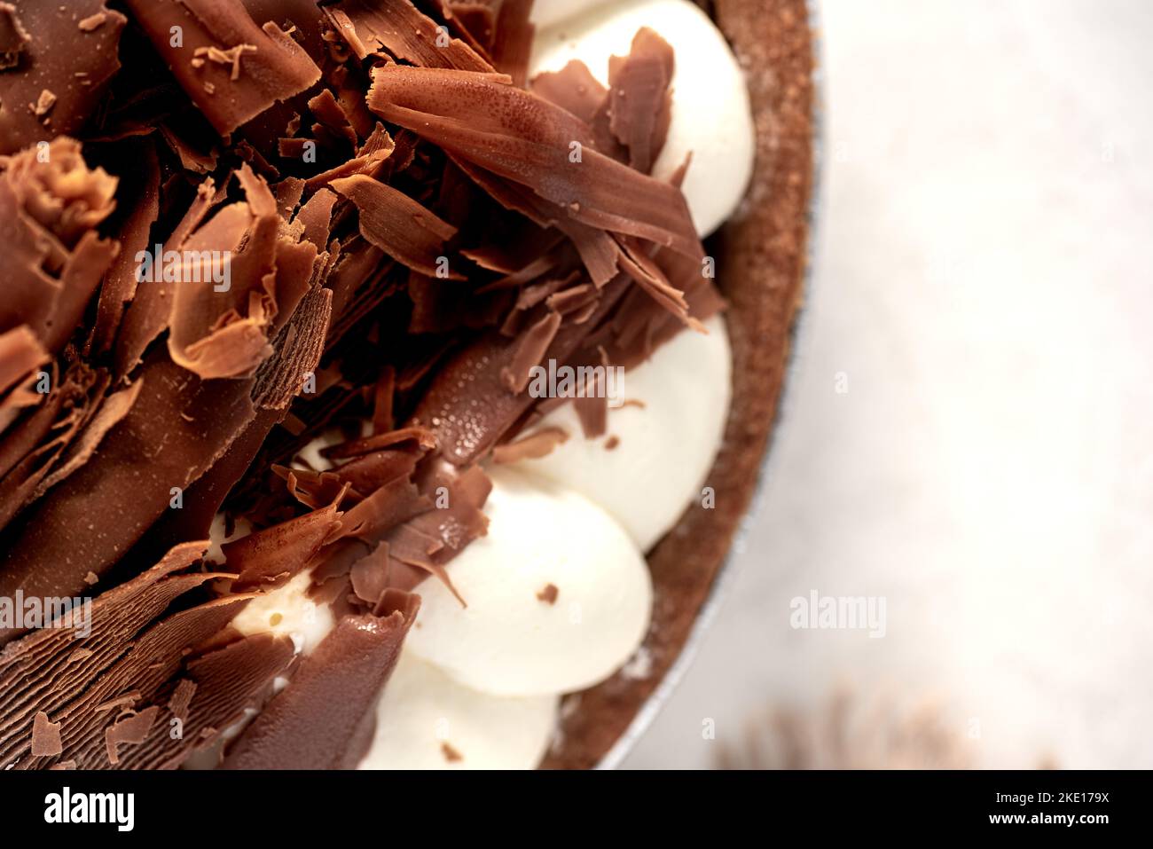 Close up of the edge of a chocolate pie with chocolate shavings Stock Photo