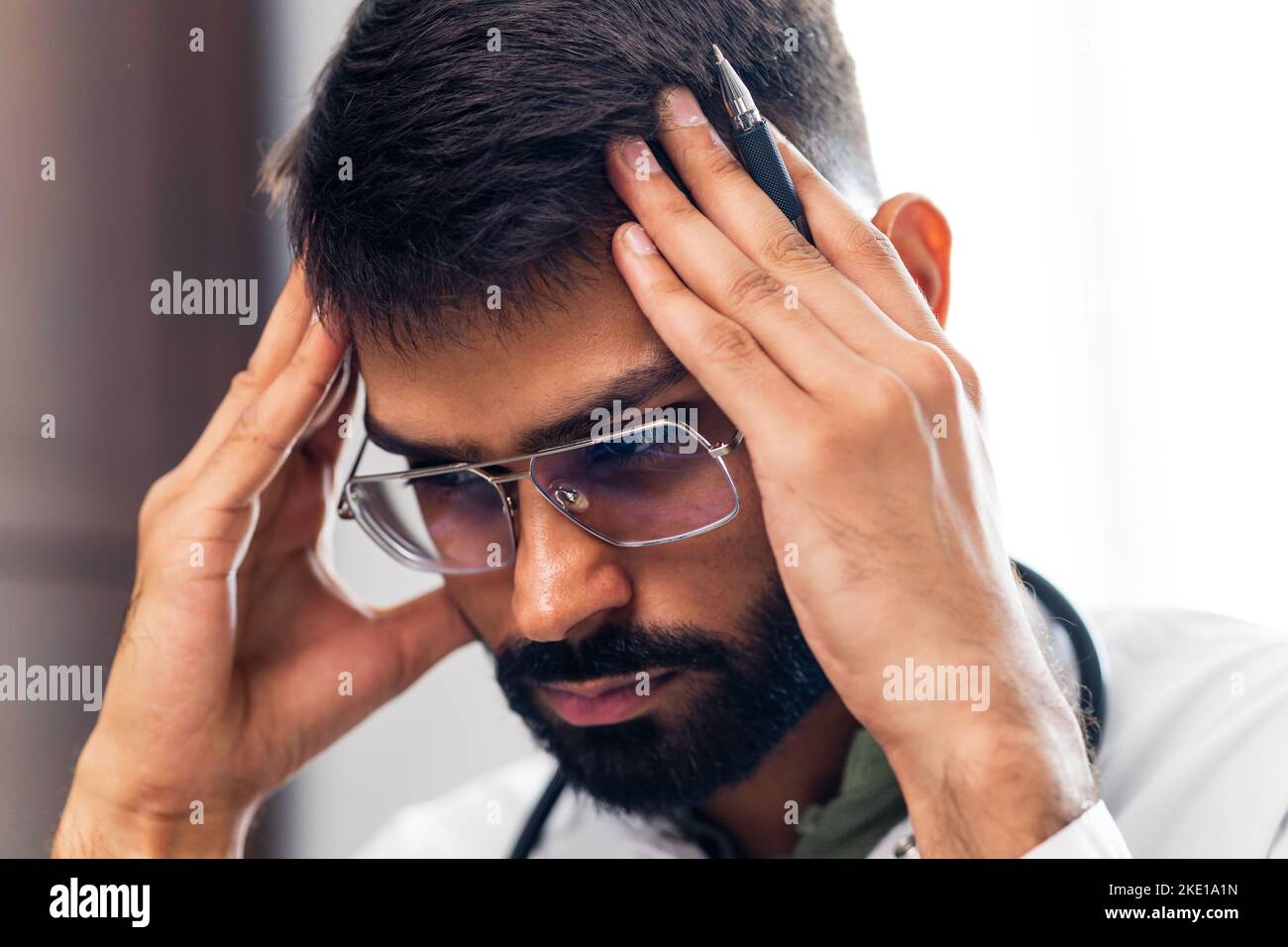 Exhausted tired man doctor hi-res stock photography and images - Alamy