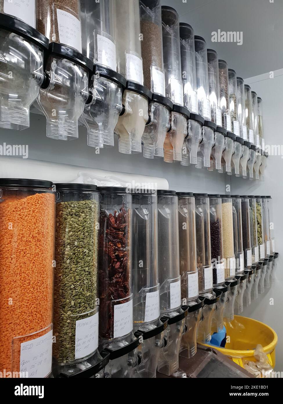 A vertical shot of different types of herbal teas placed in different