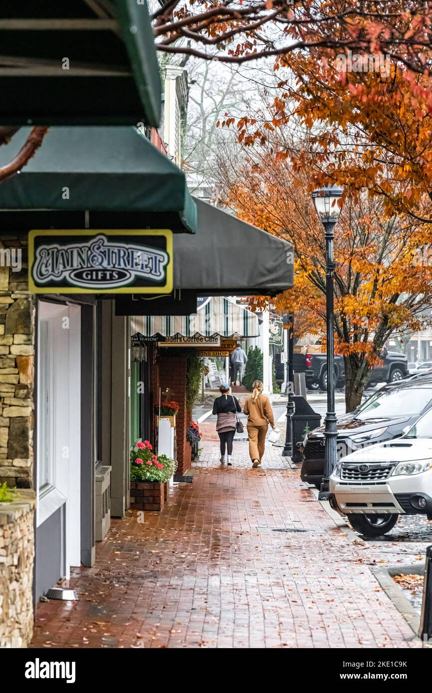 Women walking down a brick sidewalk on Main Street in Highlands, North