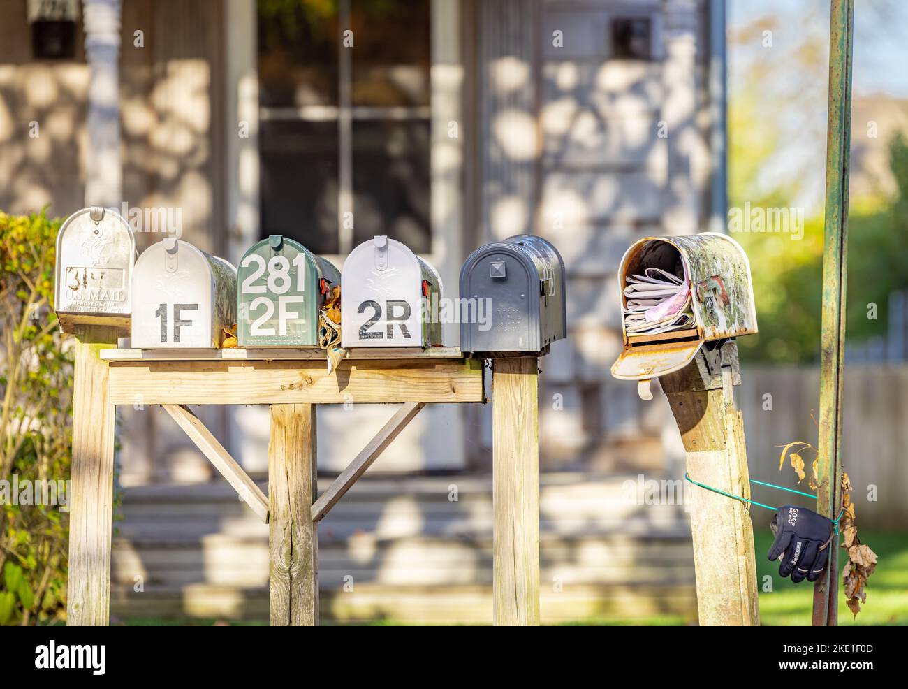 six mail boxes, one filled with mail, Sag Harbor, NY Stock Photo Alamy