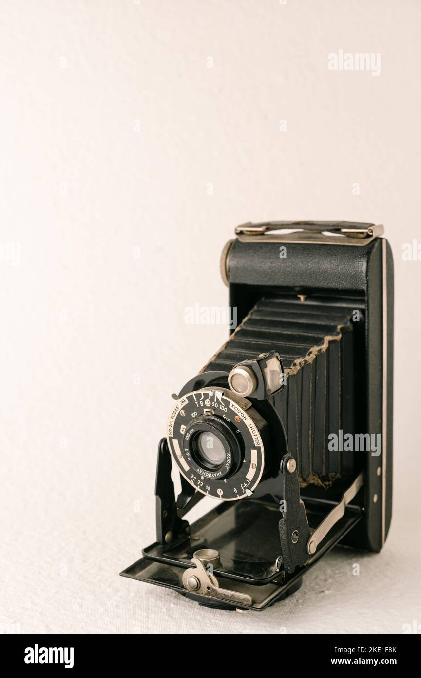 the black vintage camera on a white background Stock Photo - Alamy