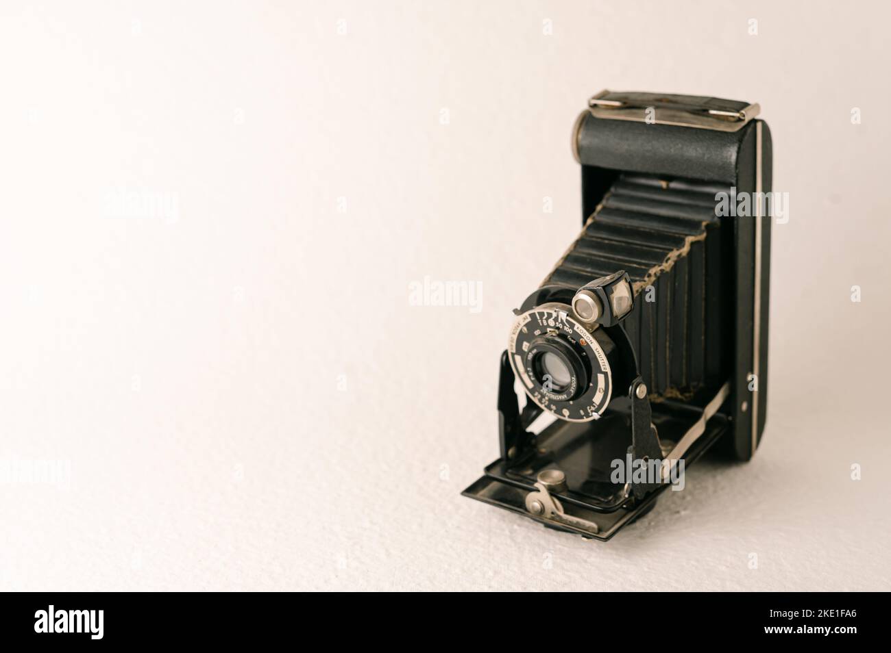 the black vintage camera on a white background Stock Photo - Alamy