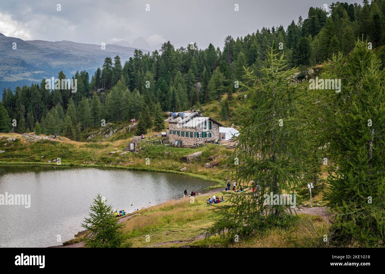 the Colbricon lakes in summer with the little alpine hut near the lakes ...