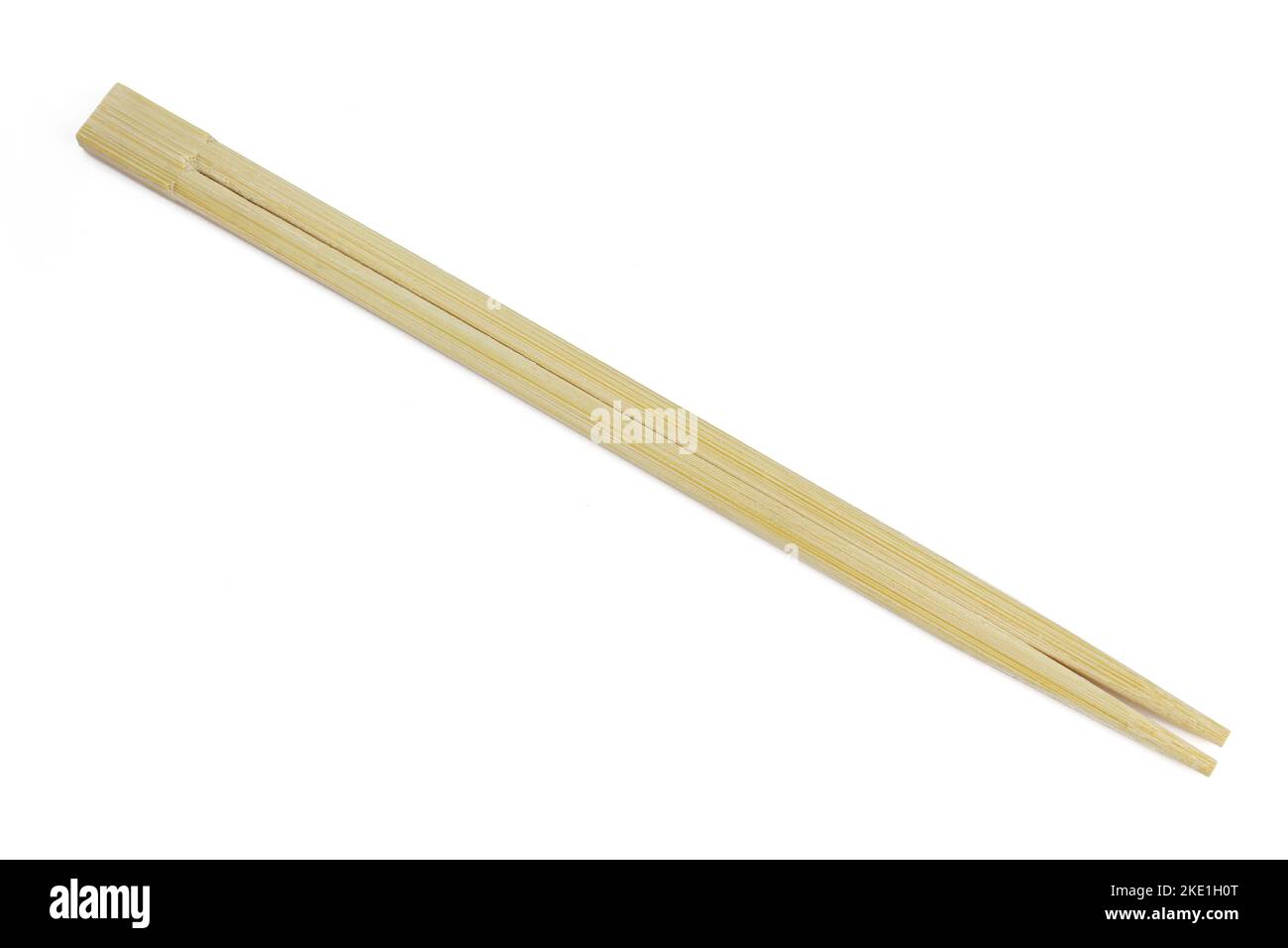 Wooden asian chopsticks isolated on white background. Bamboo food tool Stock Photo