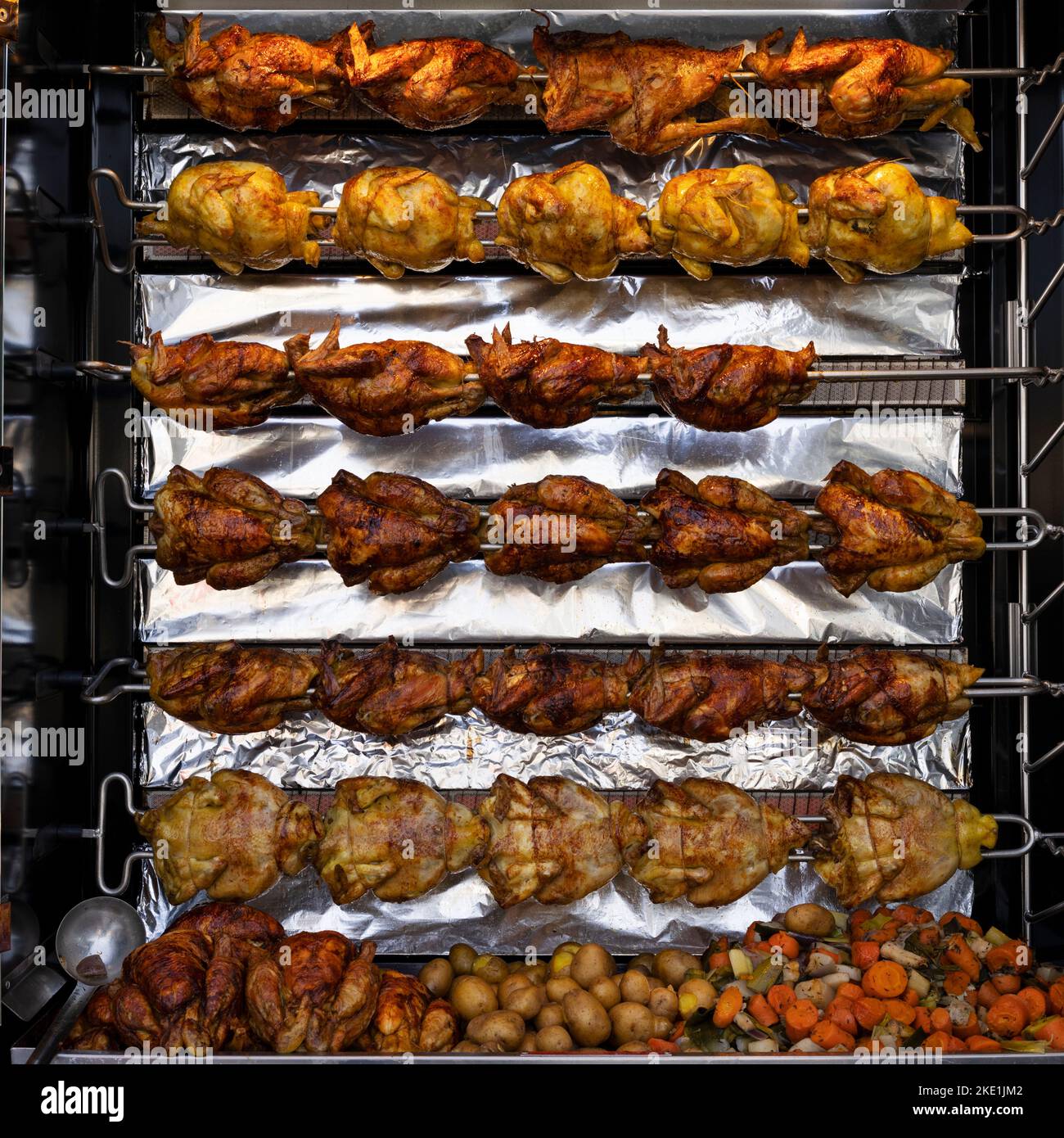 roti chickens in a market, Lyon, France Stock Photo