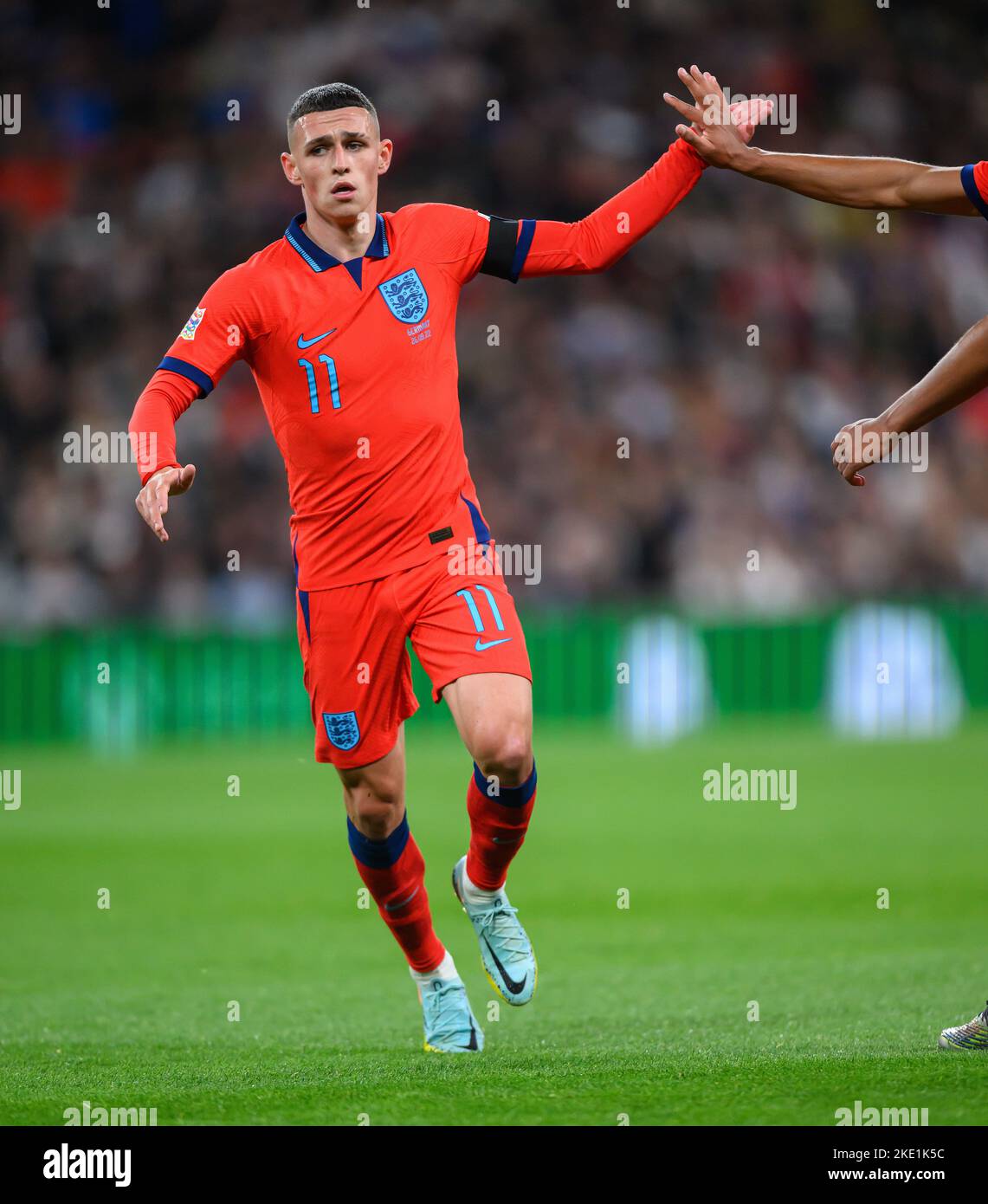 26 Sep 2022 - England v Germany - UEFA Nations League - League A - Group 3 - Wembley Stadium  England's Phil Foden high fives with Jude Bellingham during the UEFA Nations League match against Germany. Picture : Mark Pain / Alamy Live News Stock Photo