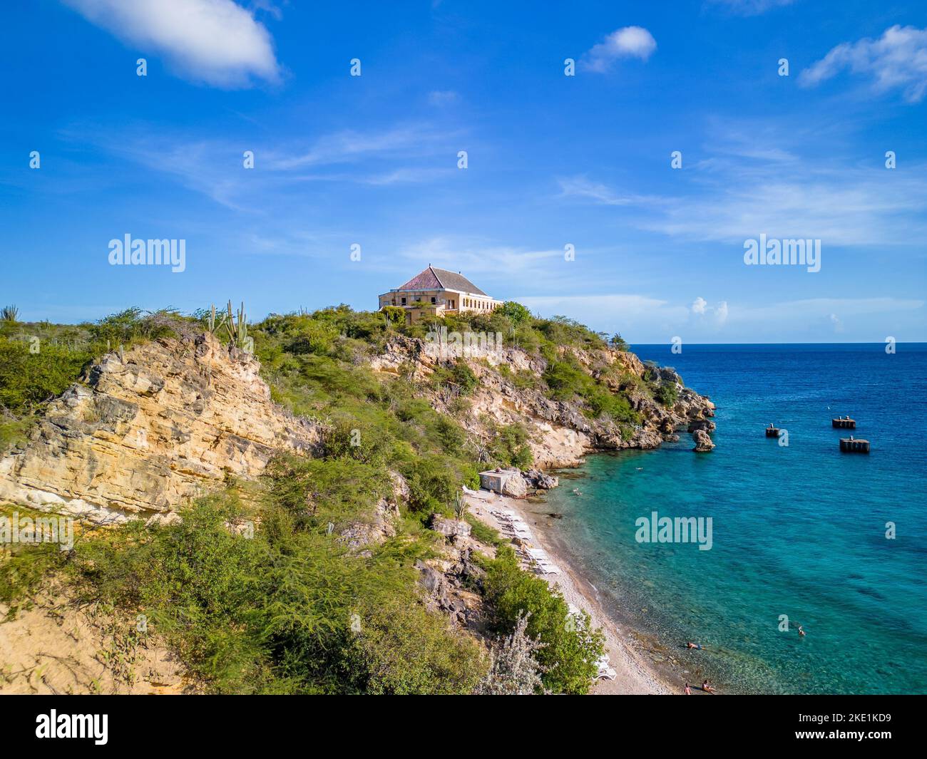 An aerial shot of the scenic Caracas Bay in Willemstad Curacao with blue seawater and skyscape Stock Photo