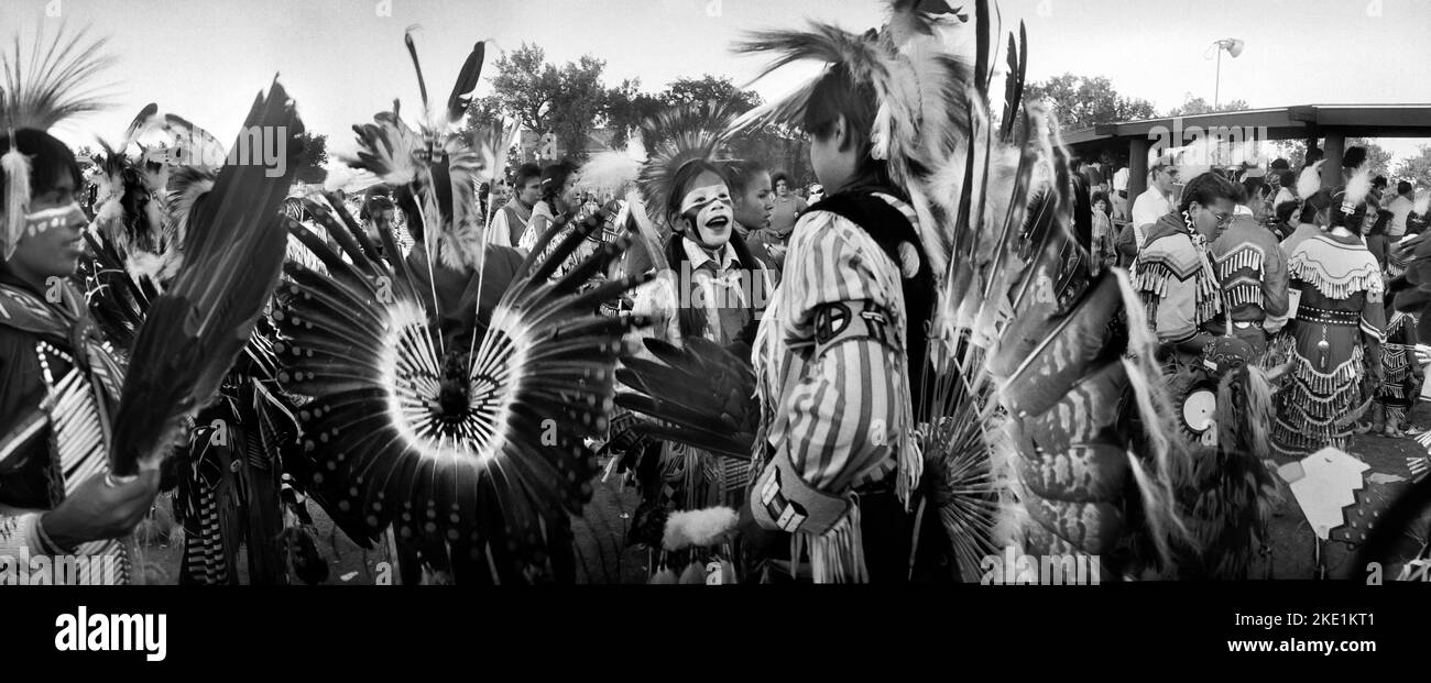 Indigenous Peoples Native American dancers in traditional regalia at the United Tribes Technical College International Powwow in Bismarck, ND. Stock Photo