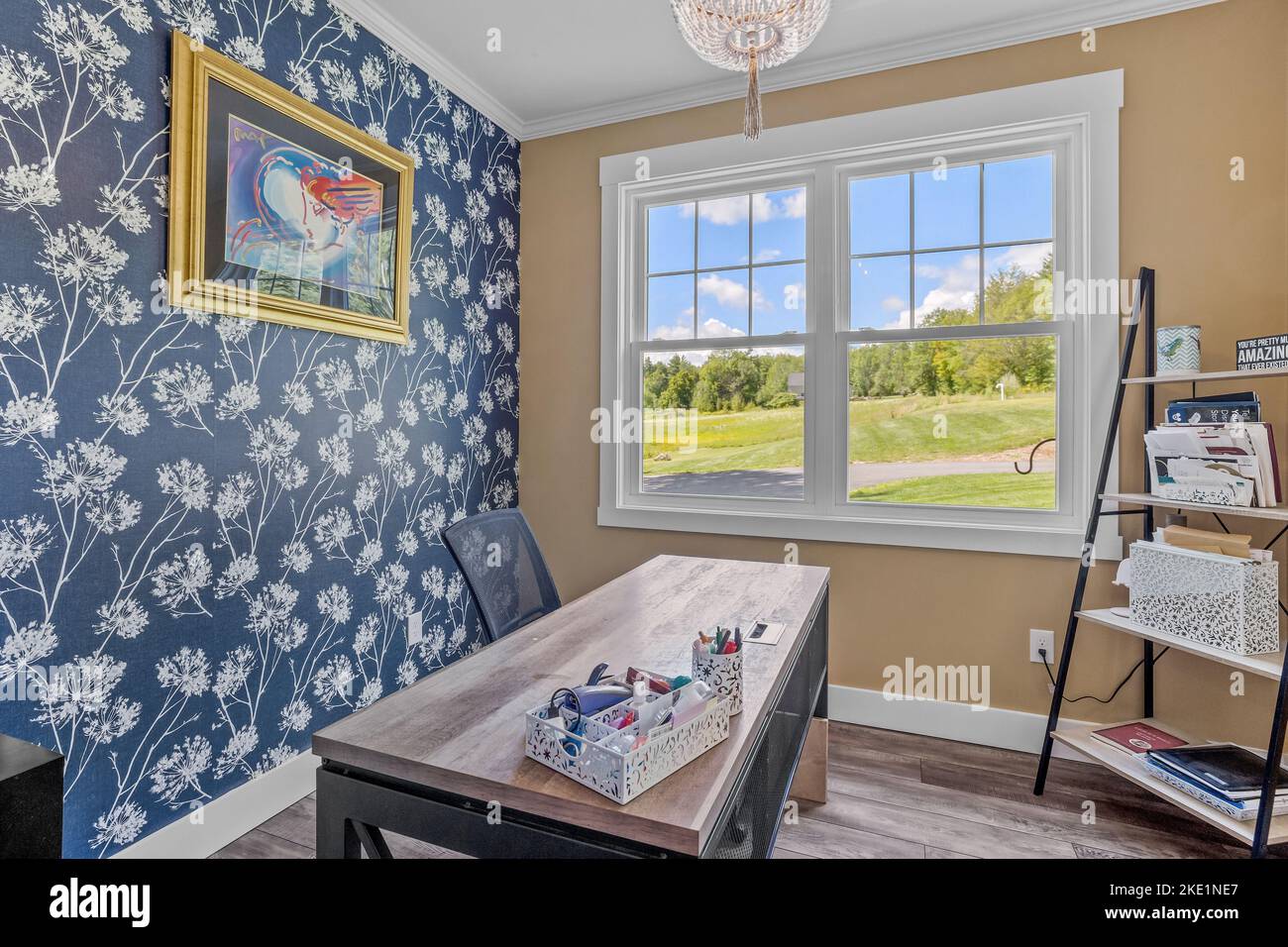 The interior design of a beautiful office room with a desk and a window view in a modern