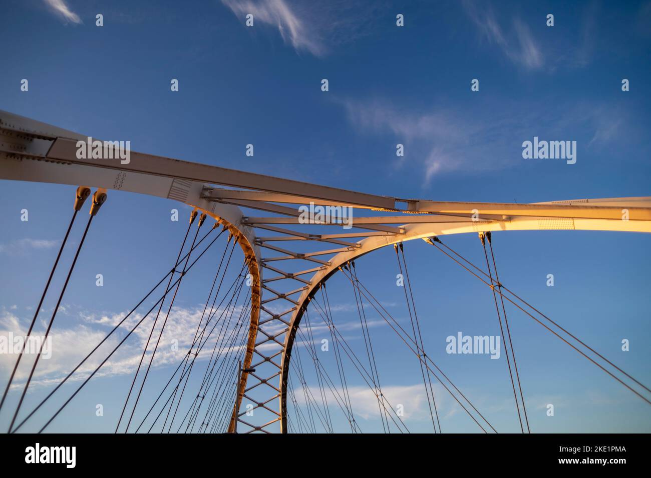 The Broadway Street Bridge spanning over the  Arkansas River, in downtown Little Rock, Arkansas  at sunrise. Stock Photo