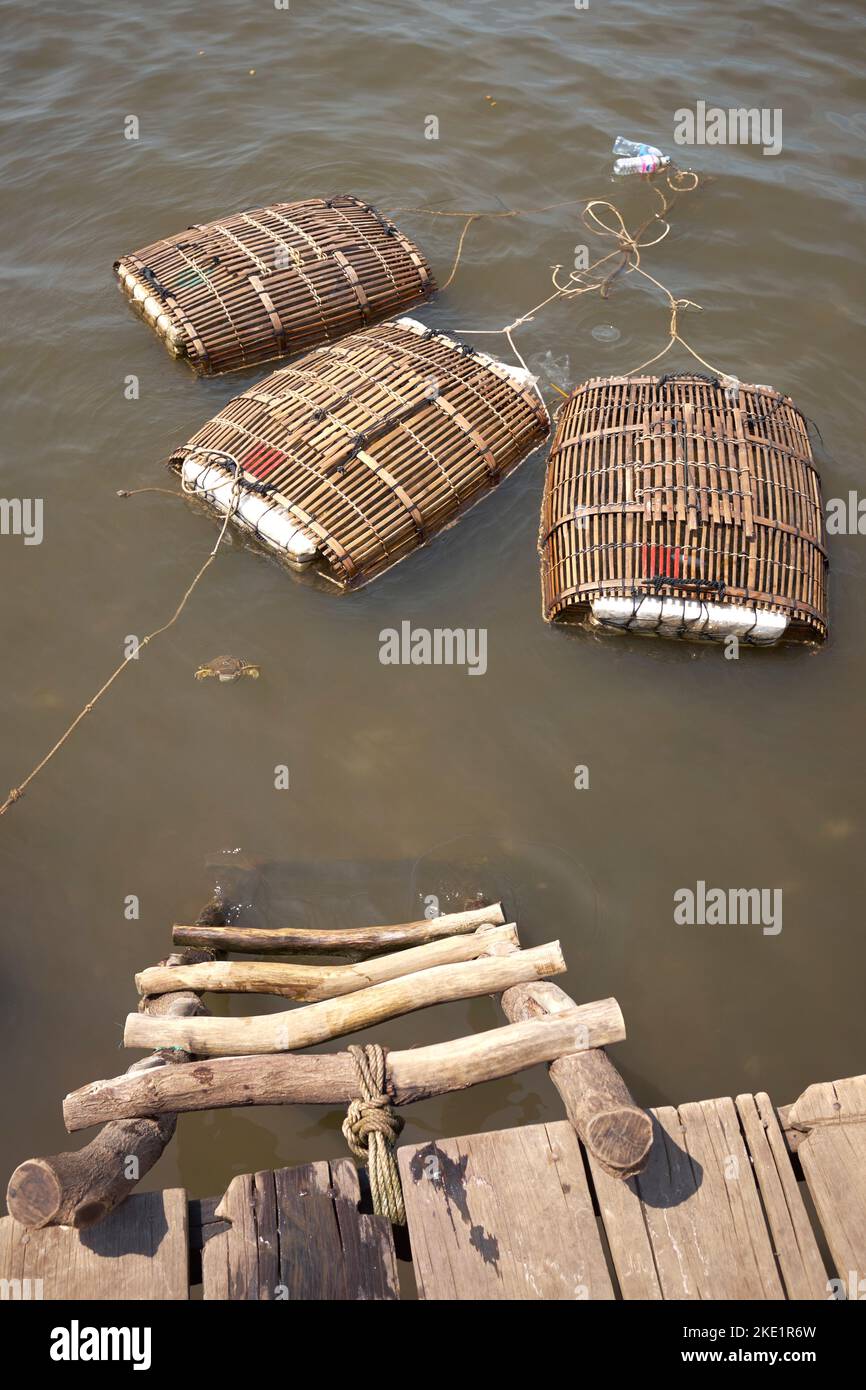 Traditional Bamboo Crab Fishing Cages at Kep Market in Cambodia Stock Photo