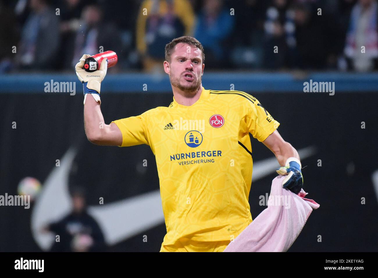 Rostock, Germany. 09th Nov, 2022. Soccer: 2nd Bundesliga, Hansa Rostock - 1. FC Nürnberg, Matchday 16, Ostseestadion. Nuremberg goalkeeper Christian Mathenia angrily throws away his water bottle after the game. Credit: Gregor Fischer/dpa - IMPORTANT NOTE: In accordance with the requirements of the DFL Deutsche Fußball Liga and the DFB Deutscher Fußball-Bund, it is prohibited to use or have used photographs taken in the stadium and/or of the match in the form of sequence pictures and/or video-like photo series./dpa/Alamy Live News Stock Photo