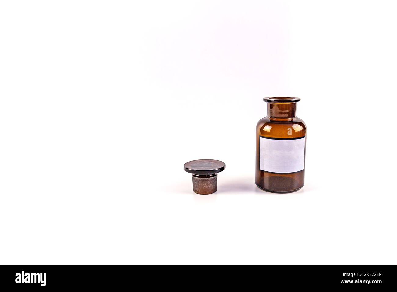 Brown medical jar isolated on white background with blank label Stock