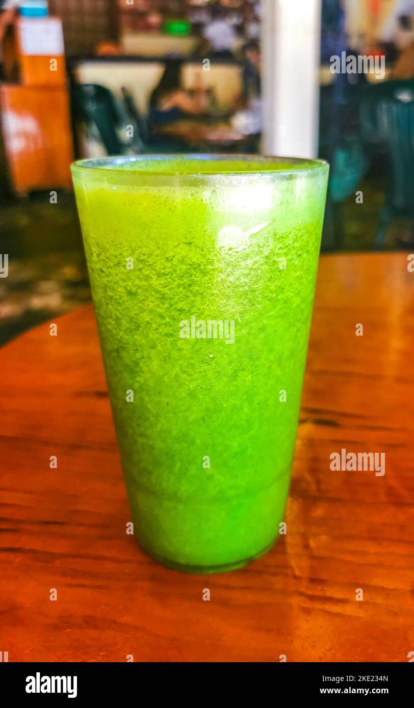 Green healthy juice smoothie in jar in El Cafecito in Zicatela Puerto