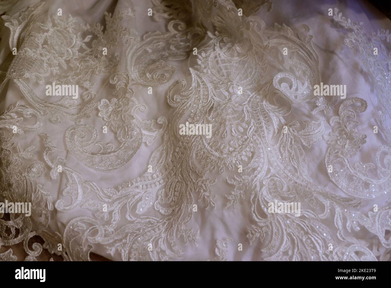 luxurious white brocade fabric detail Stock Photo
