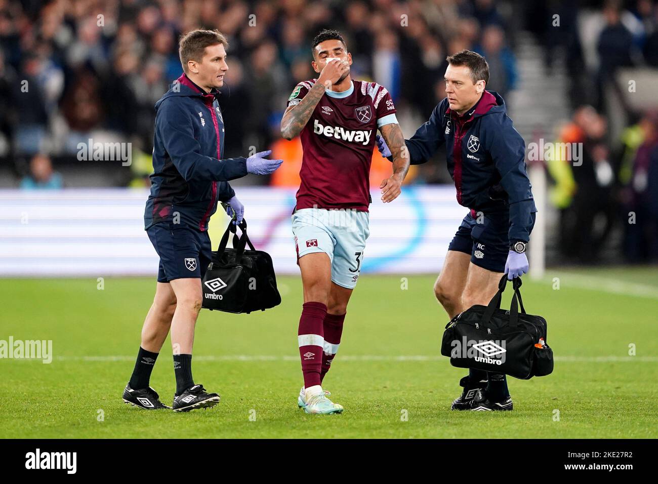 West Ham's Emerson Palmieri dos Santos receives medical attention during the Carabao Cup third round match at London Stadium, London. Picture date: Wednesday November 9, 2022. Stock Photo