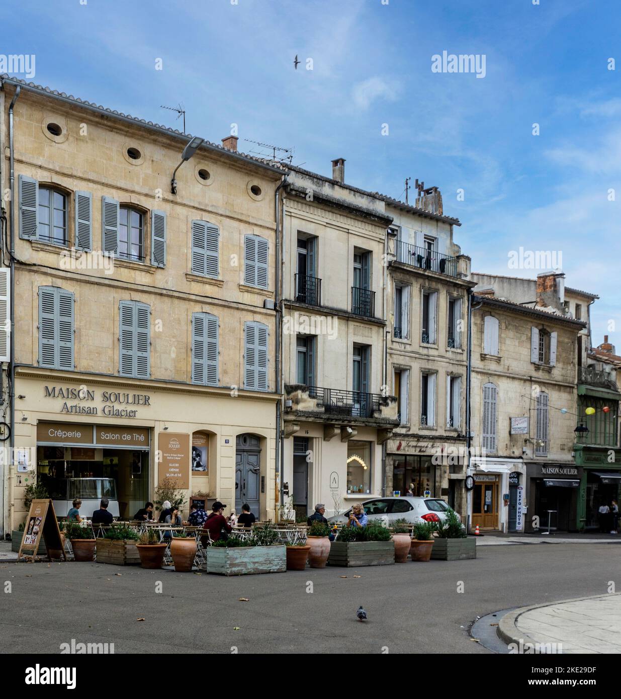 People eating outside Maison Soulier, Artisan Glacier in Arles France. Stock Photo