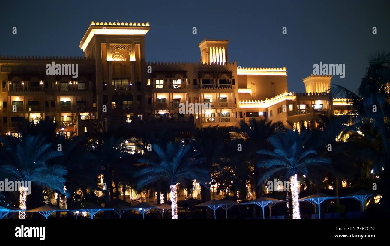 DUBAI, UNITED ARAB EMIRATES, UAE - NOVEMBER 20, 2017: Hotel Jumeirah Al Qasr Madinat, The view of the hotel at night, all in the lights, glows. High quality photo Stock Photo