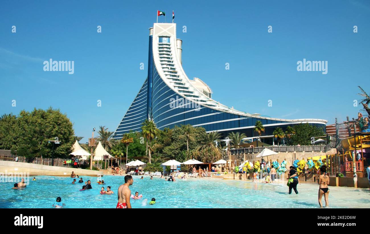 DUBAI, UNITED ARAB EMIRATES, UAE - NOVEMBER 20, 2017: Hotel JUMEIRAH BEACH HOTEL near Burj al Arab. water park Wild Wadi, on the territory of the hotel complex. High quality photo Stock Photo