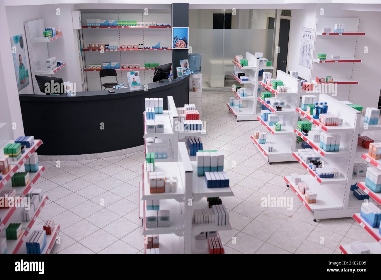 https://c8.alamy.com/comp/2KE2D95/empty-pharmacy-with-nobody-in-it-having-shelves-full-with-pharmaceutical-products-ready-for-opening-drugstore-desk-full-with-clients-medical-prescription-health-care-products-medicine-service-support-2KE2D95.jpg