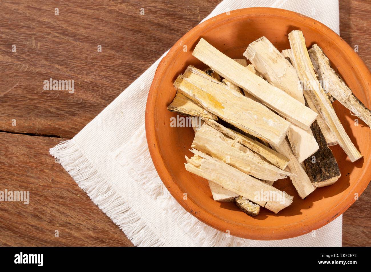 Quassia Amara - Stems Of Quassia Medicinal plant; On Wood Background Stock Photo