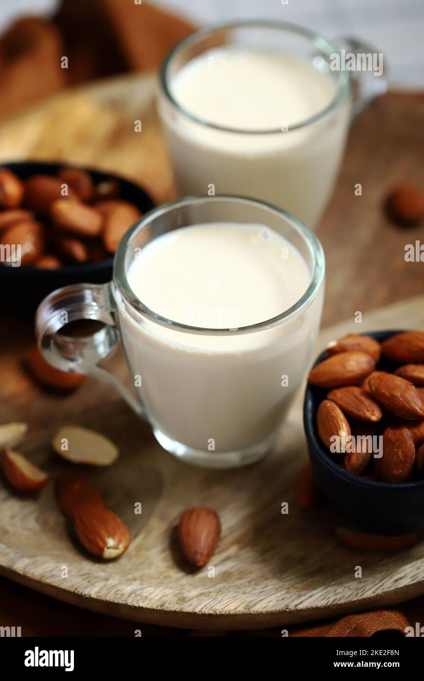 Almonds and almond milk in a glass. Stock Photo