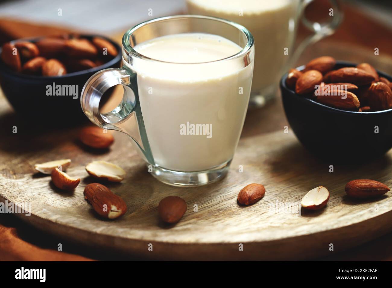 Almonds and almond milk in a glass. Stock Photo