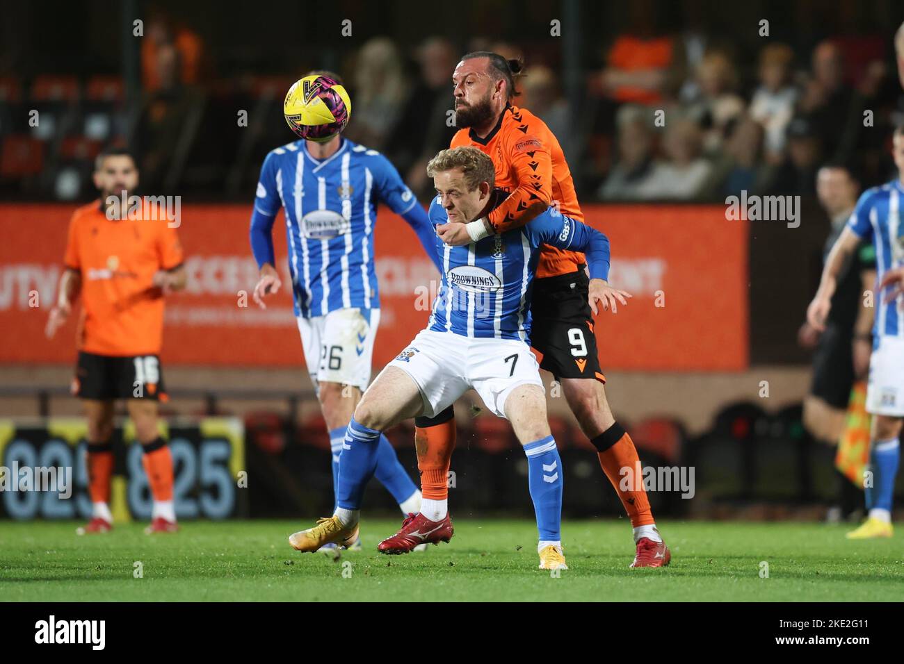 9th November 2022; Tannadice Park, Dundee,  Scotland: Scottish Premier League football, Dundee United versus Kilmarnock; Steven Fletcher of Dundee United challenges for the ball with Rory McKenzie of Kilmarnock Stock Photo