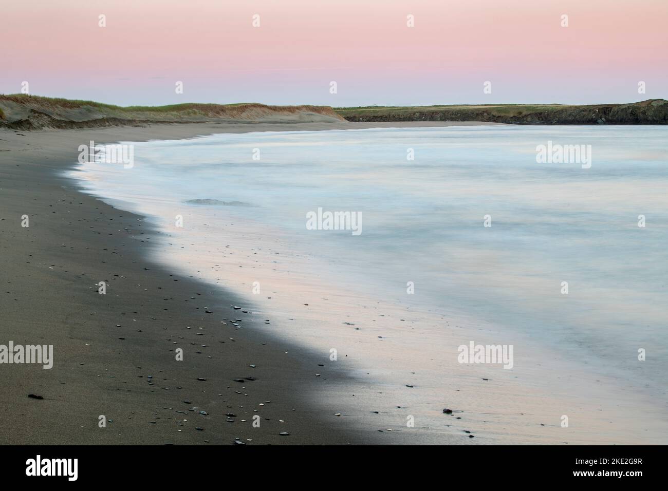 Beach and surf near sunset, J.T. Cheeseman Provincial Park, Newfoundland and Labrador NL, Canada Stock Photo