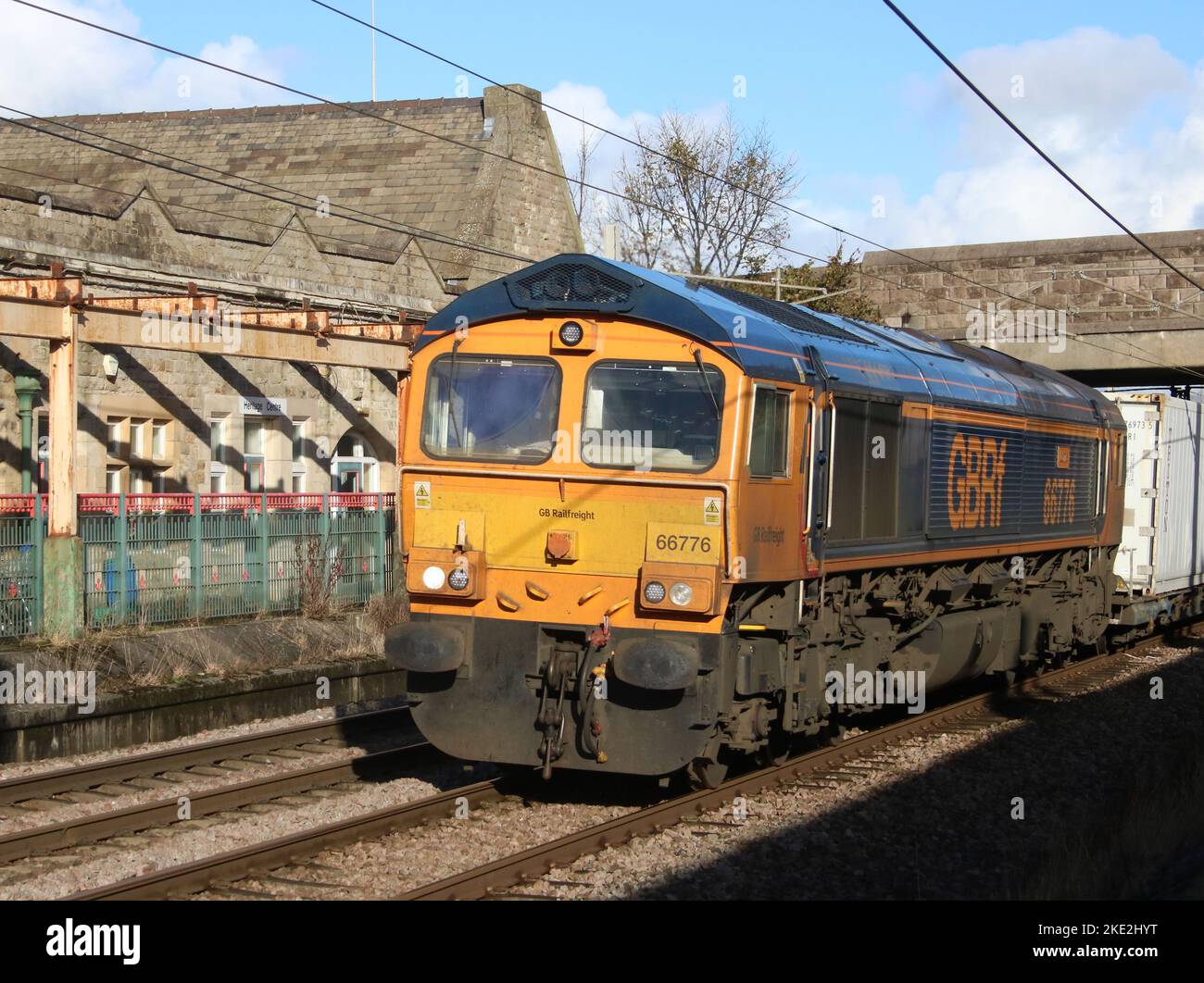 Gb Railfreight class 66, 66776 named Joanne, hauling container train passing through Carnforth on the West Coast Main line on 9th November 2022. Stock Photo