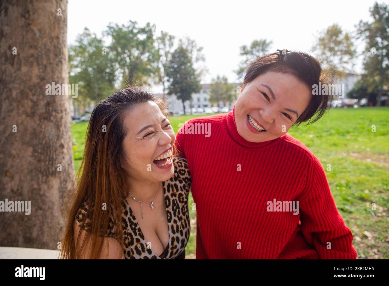 Happy middle age women having fun together outdoor. Friendship concept. Stock Photo