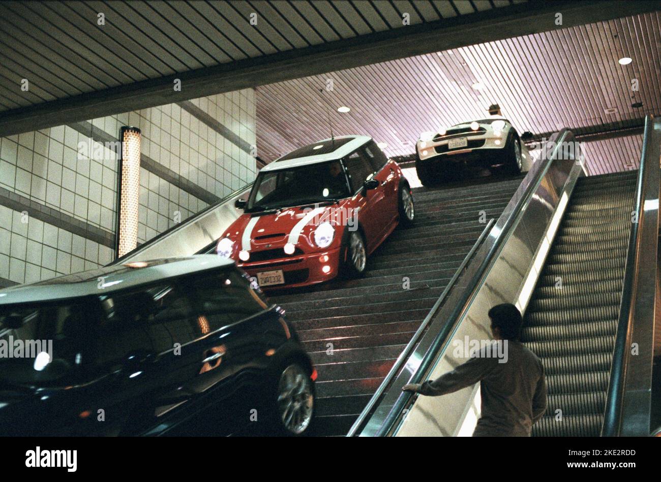 THE ITALIAN JOB, MINI CARS DRIVE DOWN STAIRWAY, 2003 Stock Photo