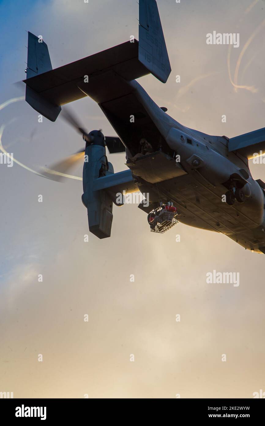 A U.S. Marine Corps MV-22B Osprey assigned to Marine Aviation Weapons and Tactics Squadron One (MAWTS-1), conducts live hoist exercises during Weapons and Tactics Instructor (WTI) course 1-23 at San Clemente Island, California, Oct. 28, 2022. WTI is a seven-week training event hosted by MAWTS-1, providing standardized advanced tactical training and certification of unit instructor qualifications to support Marine aviation training and readiness, and assists in developing and employing aviation weapons and tactics. (U.S. Marine Corps photo by Cpl. Celestino HernandezSilvar) Stock Photo