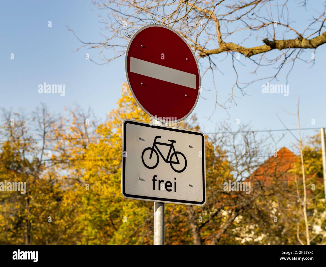 No entry traffic sign with the addition that bicycles are allowed. Road sign for car divers at a one-way street in Germany. Regulations for traffic. Stock Photo