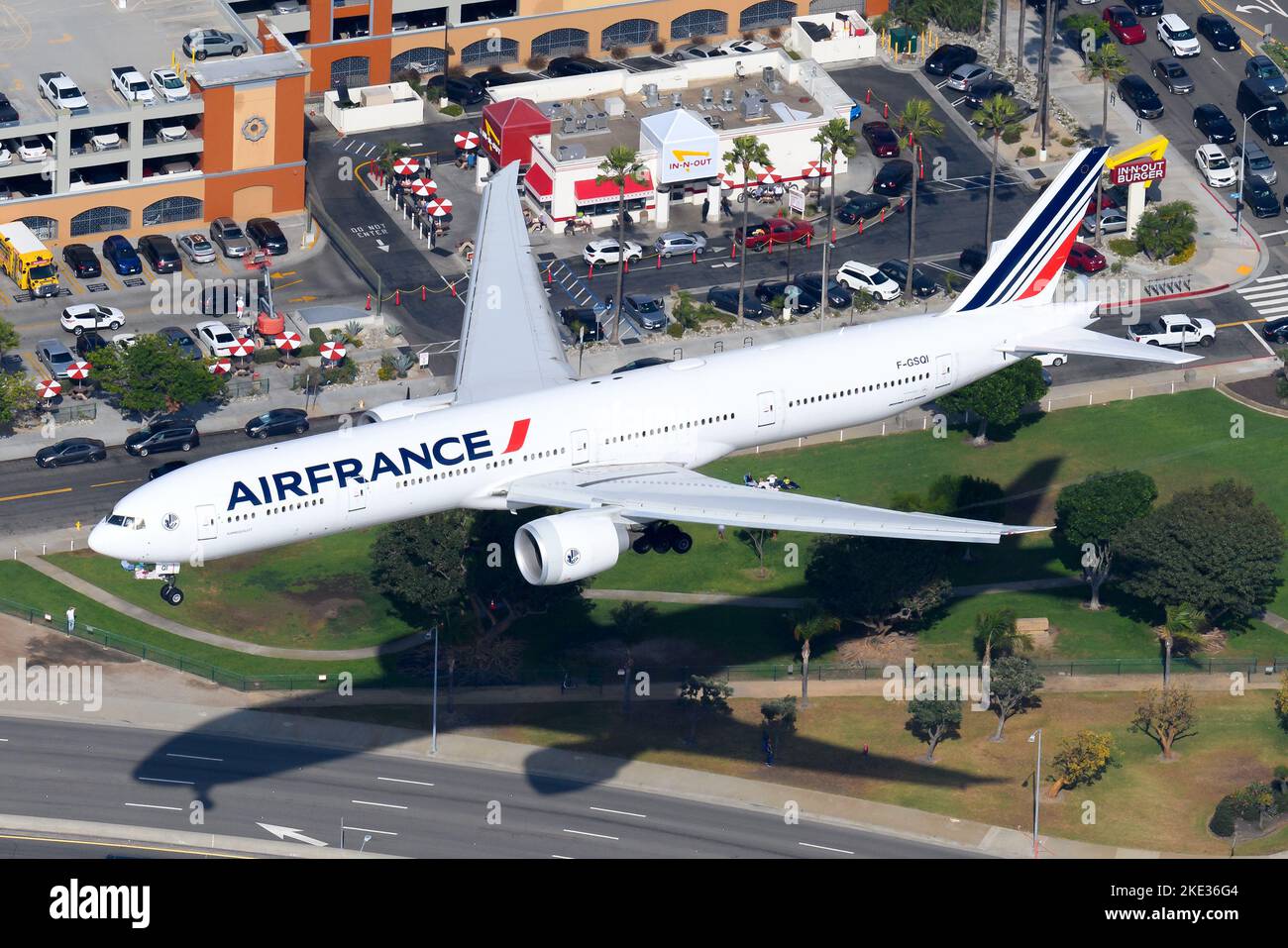 Air France Boeing 77W plane from above. Airplane of french airline and 777-300ER model. Air France 777 aircraft registered as F-GSQI. Stock Photo