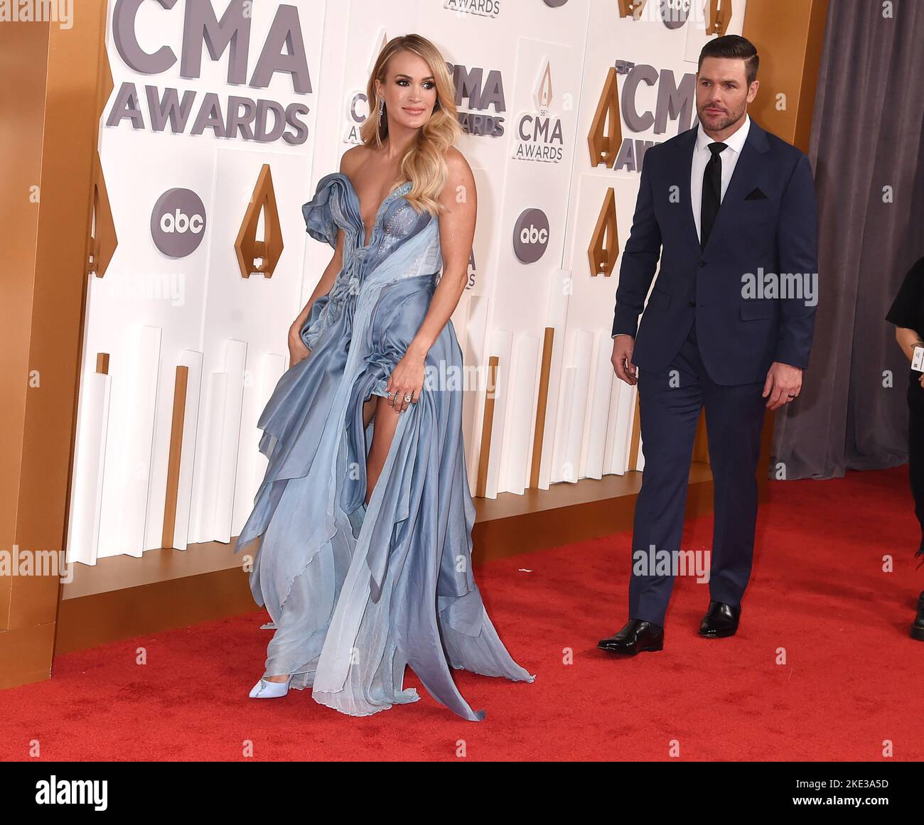 Carrie Underwood and Mike Fisher arriving at the 56th Annual Country