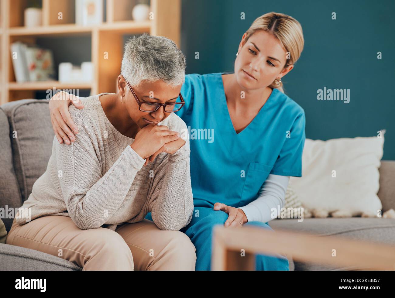 Bad News Support And Nurse With A Senior Patient Sitting On A Sofa In Her Office At The 4660