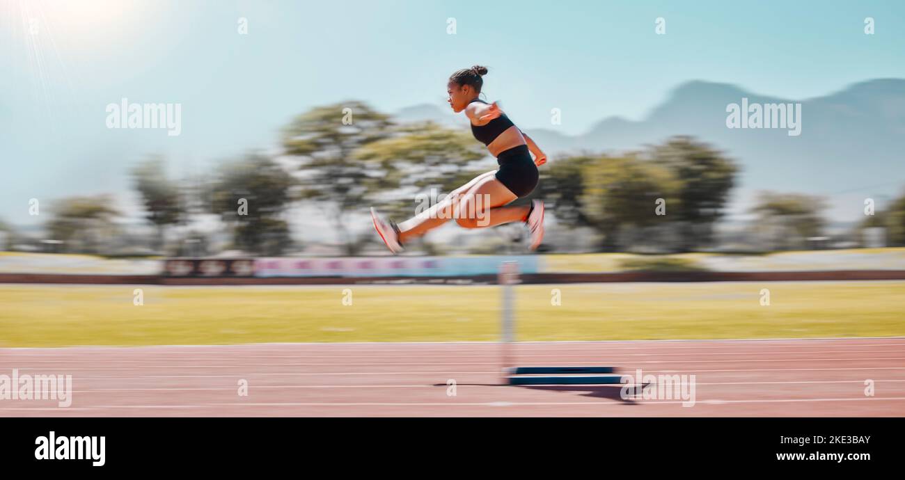 Athlete, sports and woman jump hurdle for track and field event for