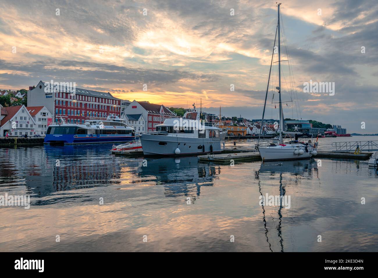 Stavanger, Norway - August 14 2022: View of Vagen, the port area of the city at sunset. Stock Photo