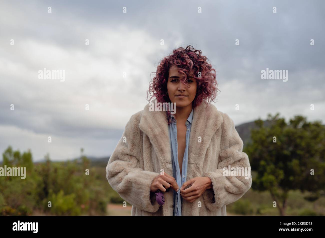 Beautiful woman curly brown hi-res stock photography and images - Alamy