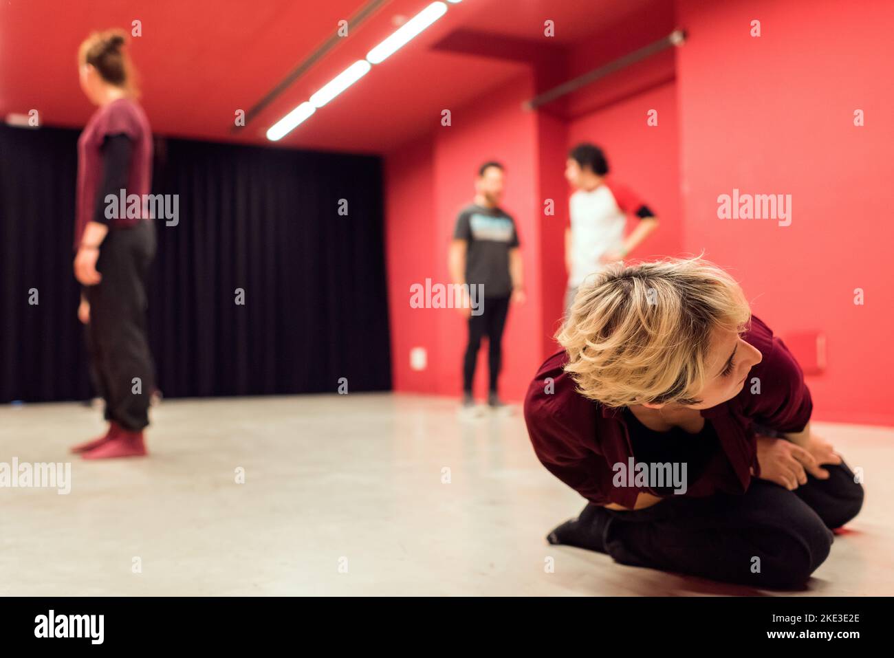 theater students doing floor exercises Stock Photo