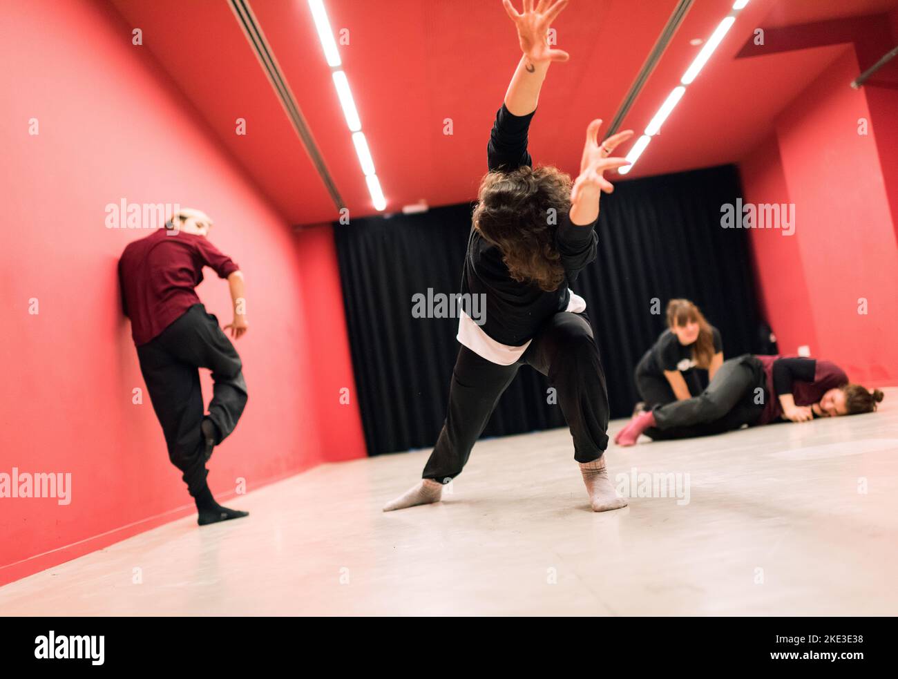 theater students doing floor exercises and stretching Stock Photo